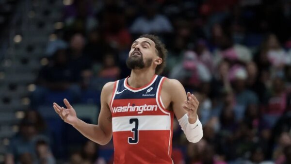 Relatório: Trae Young da Wizards se tornará agente livre após recusar opção